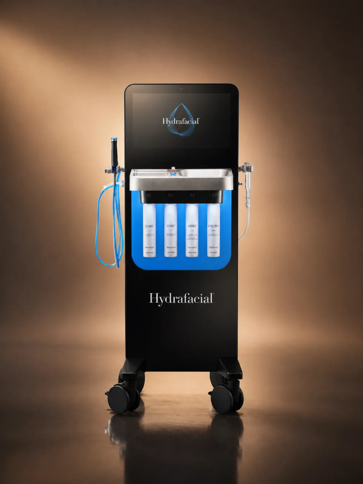 Full HydraFacial station, its four serums and two handpieces, facial treatment in Sainte-Rose, Laval