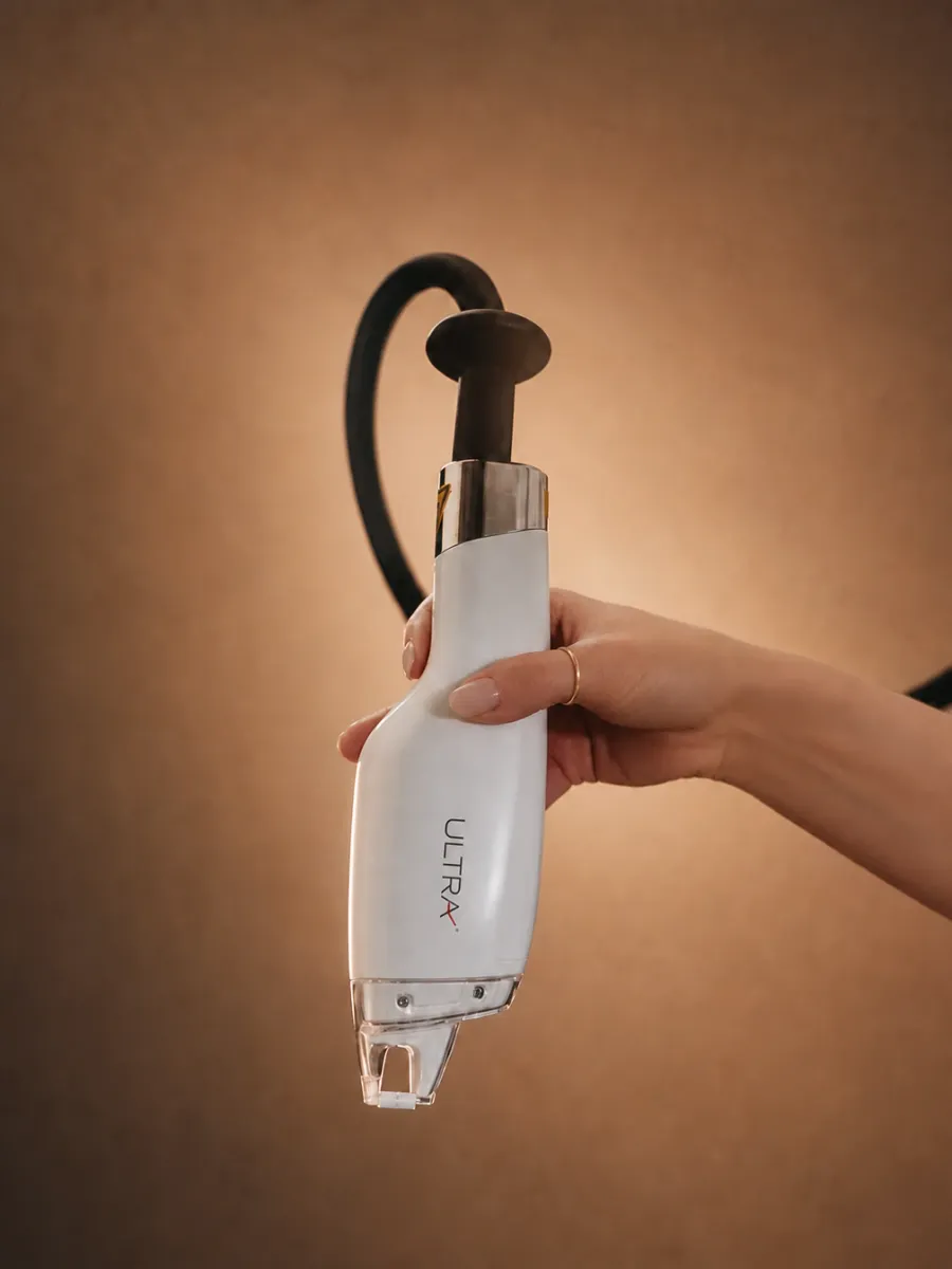 LaseMD Ultra laser handpiece held in hand